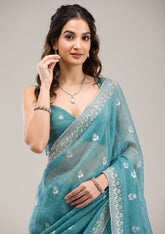 Teal Tissue Saree with Silver Zariwork – Elegant & Sheer Ethnicwear