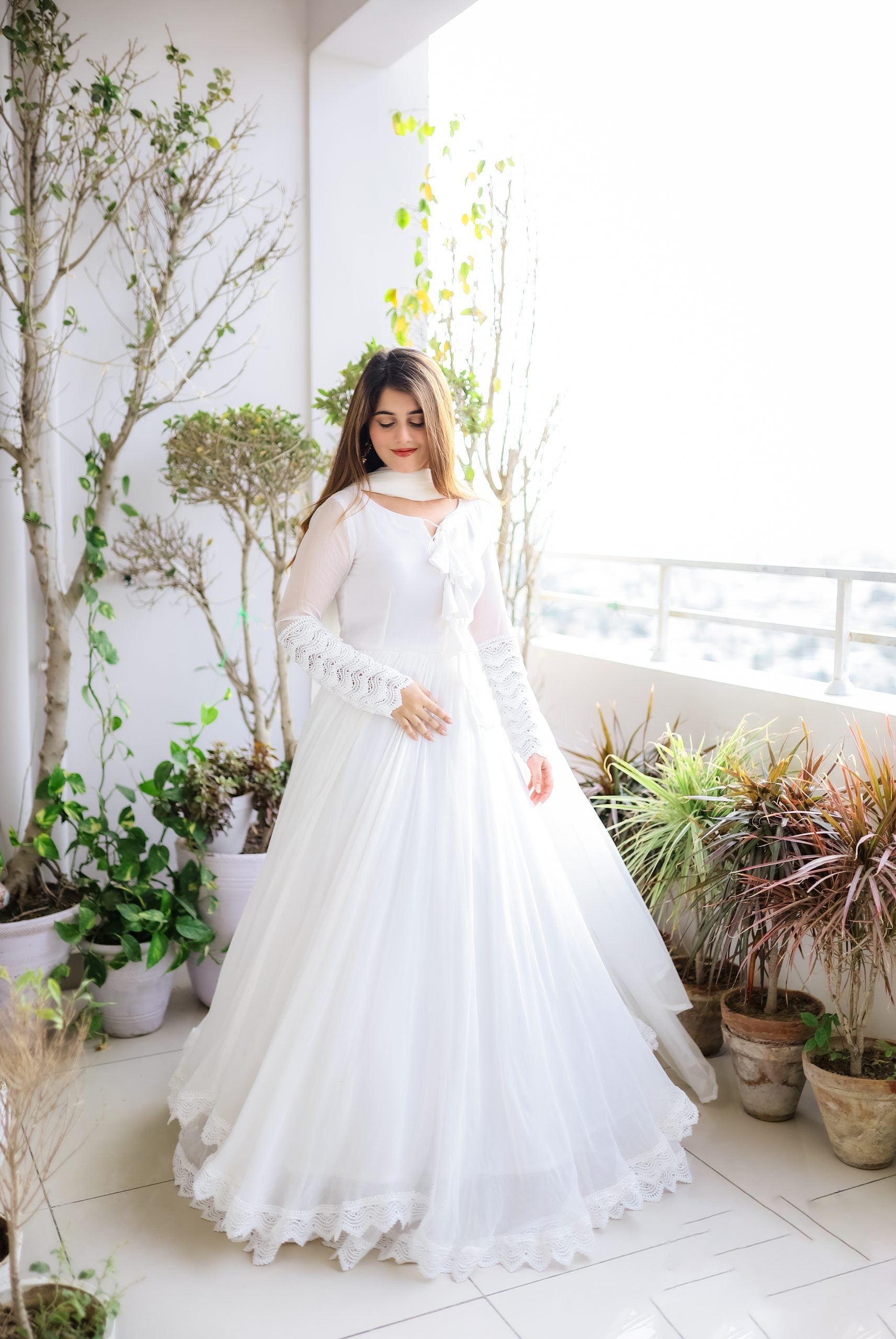 Faux Georgette Anarkali Gown with Lace Work & Tassel Detailing – Party Wear